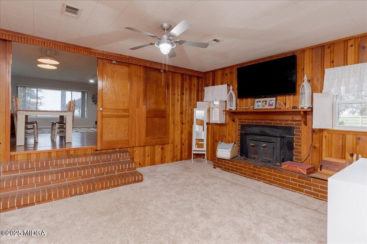 150 Moss Oaks Road Perry, GA 31069 - Photo 24 of 51 a living room with furniture and a flat screen tv