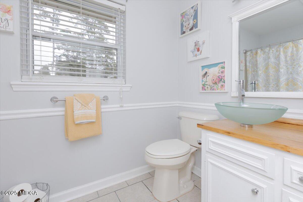 150 Moss Oaks Road Perry, GA 31069 - Photo 36 of 51 a bathroom with a sink and a toilet