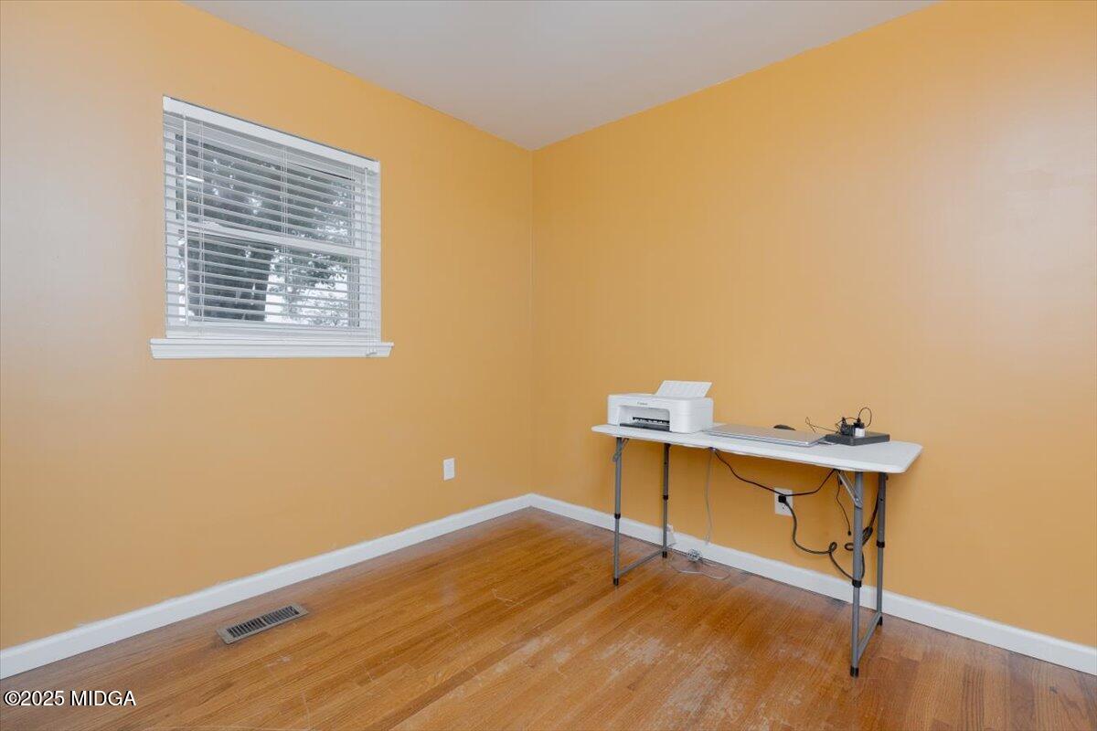 150 Moss Oaks Road Perry, GA 31069 - Photo 40 of 51 a view of a workspace with wooden floor