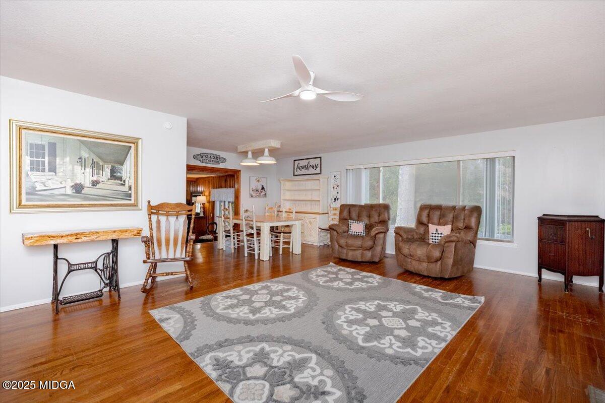 150 Moss Oaks Road Perry, GA 31069 - Photo 7 of 51 a living room with furniture rug and wooden floor