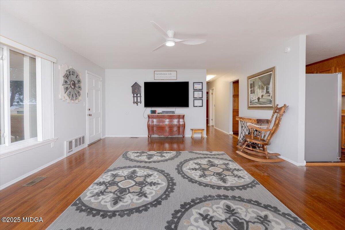 150 Moss Oaks Road Perry, GA 31069 - Photo 9 of 51 a bedroom with a bed and a flat screen tv