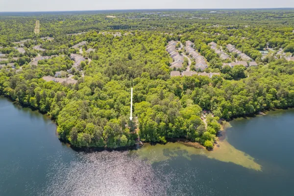 a view of a lake with an outdoor space