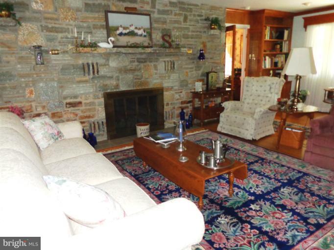 1829 Clear View Road Union Bridge, MD 21791 - Photo 1 of 20 a living room with furniture and a fireplace