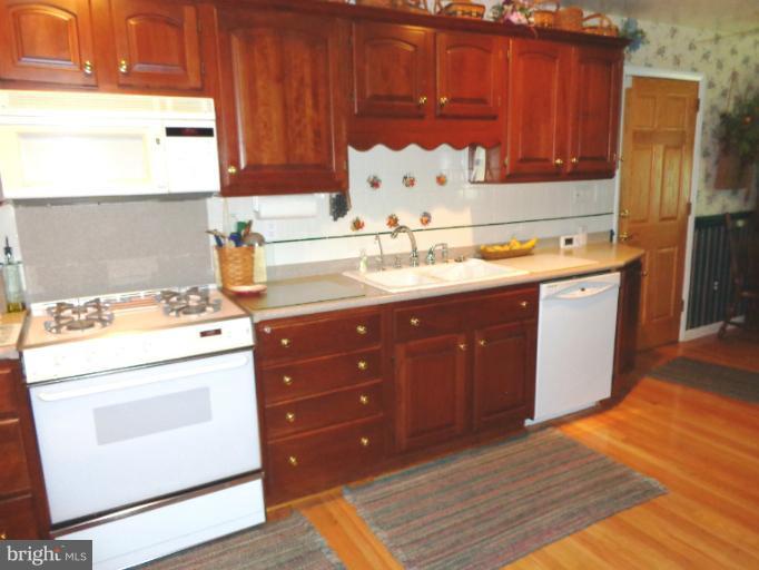 1829 Clear View Road Union Bridge, MD 21791 - Photo 2 of 20 a kitchen with a sink and cabinets