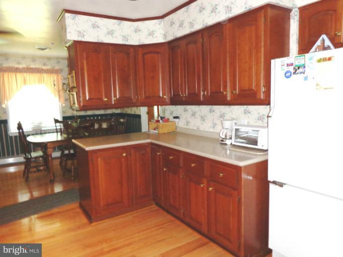 1829 Clear View Road Union Bridge, MD 21791 - Photo 11 of 20 a kitchen with a sink and cabinets