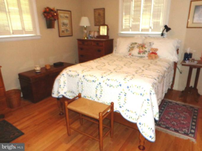 1829 Clear View Road Union Bridge, MD 21791 - Photo 17 of 20 a bedroom with a bed and a dresser in it
