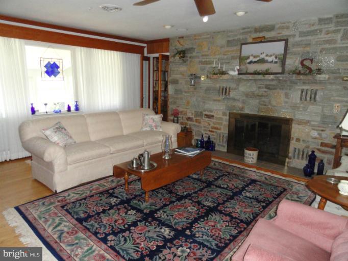 1829 Clear View Road Union Bridge, MD 21791 - Photo 4 of 20 a living room with furniture and a fireplace