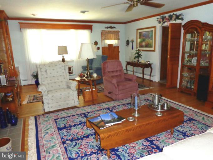 1829 Clear View Road Union Bridge, MD 21791 - Photo 7 of 20 a living room with furniture and wooden floor