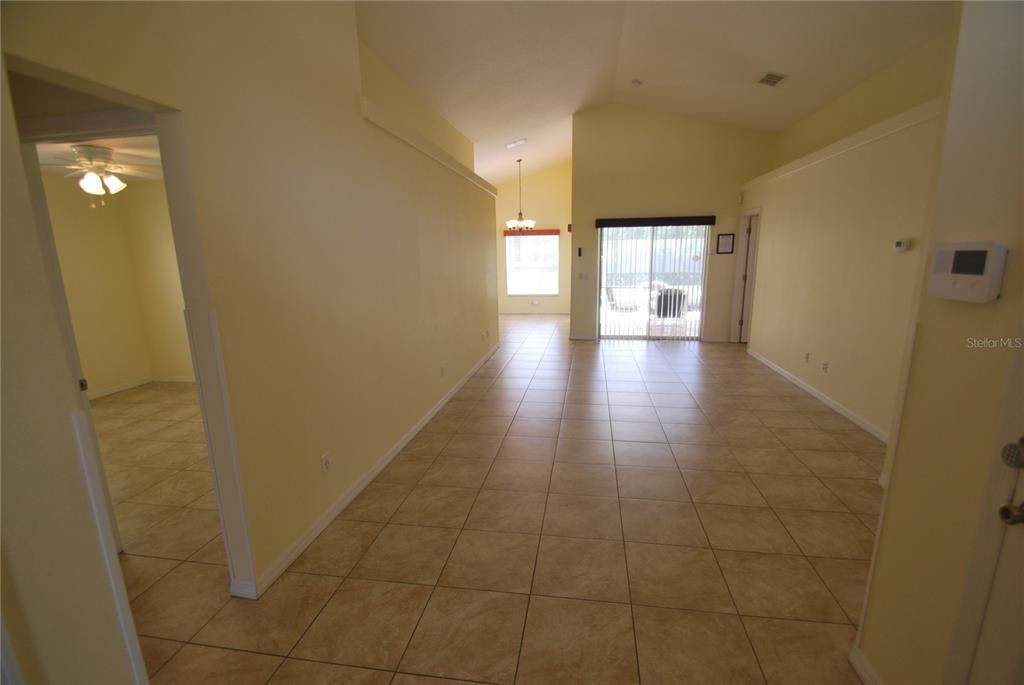 217 Robin Road Davenport, FL 33896 - Photo 5 of 27 a view of hallway with wooden floor
