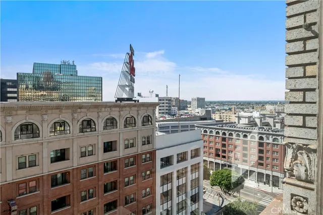 a kitchen with stainless steel appliances and a refrigerator