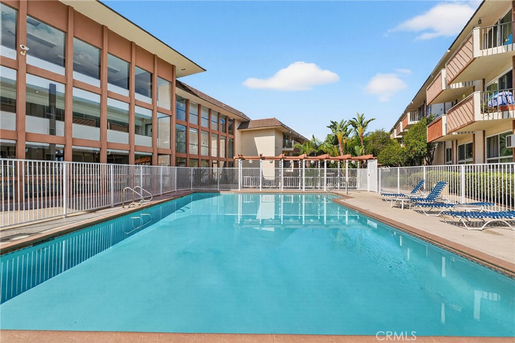 5585 Pacific Coast Highway, Unit 161 Long Beach, CA 90804 - Photo 29 of 44 a view of a house with a backyard
