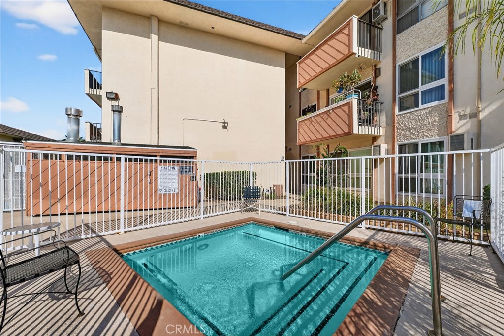 5585 Pacific Coast Highway, Unit 161 Long Beach, CA 90804 - Photo 31 of 44 a view of a balcony with wooden floor