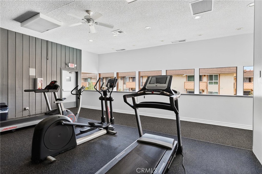 5585 Pacific Coast Highway, Unit 161 Long Beach, CA 90804 - Photo 34 of 44 a view of a room with gym equipment