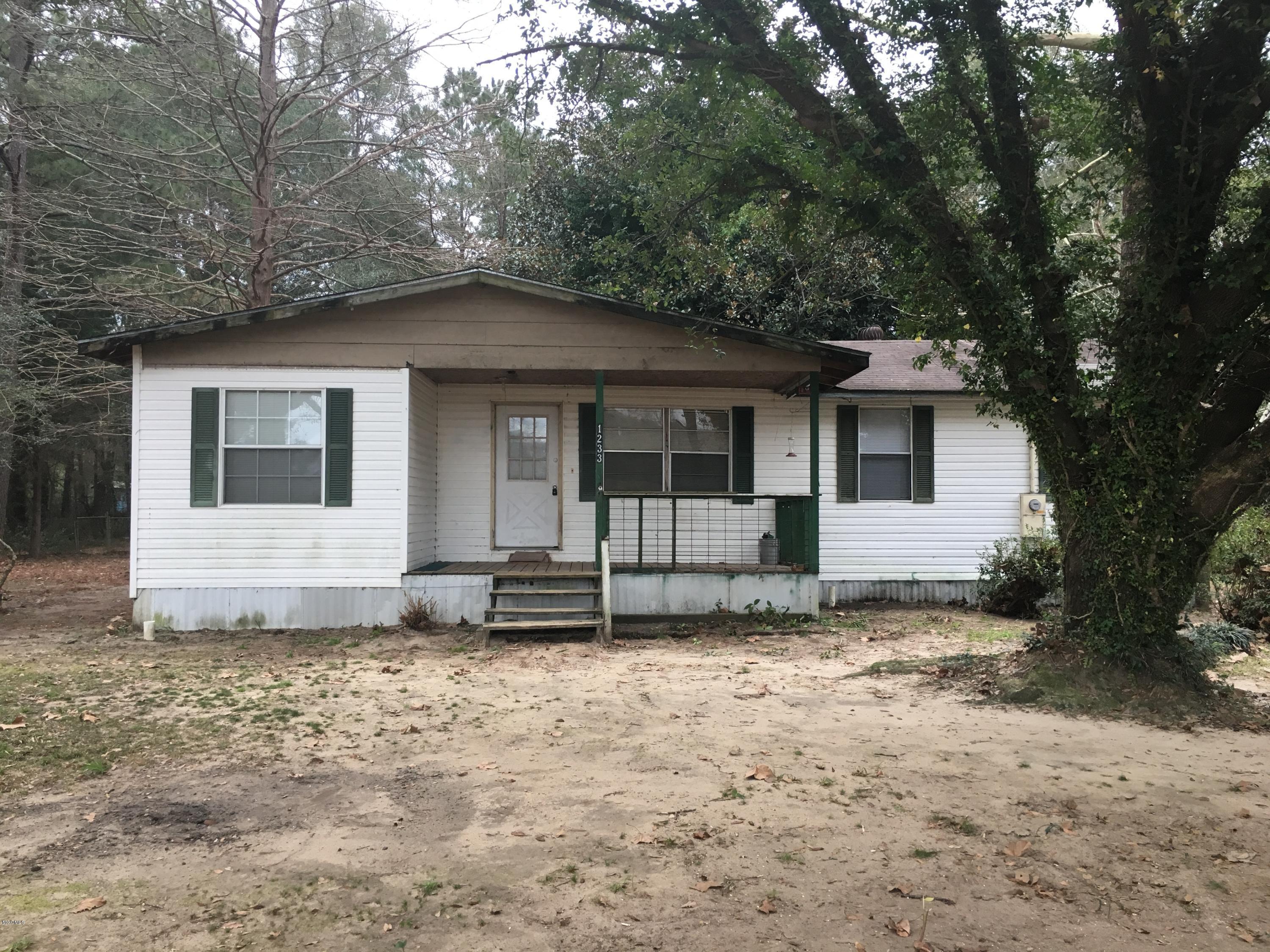 1233 Brushy Creek Road Lucedale, MS 39452 - Photo 1 of 12 BA7F8E90-E33A-4D72-90DC-7F418CAFD278