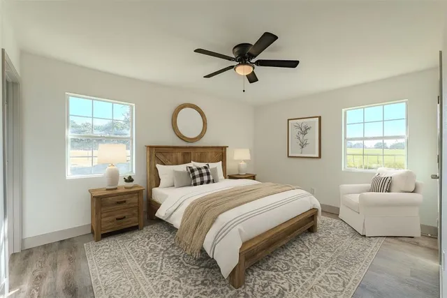 a bedroom with a bed and a couch