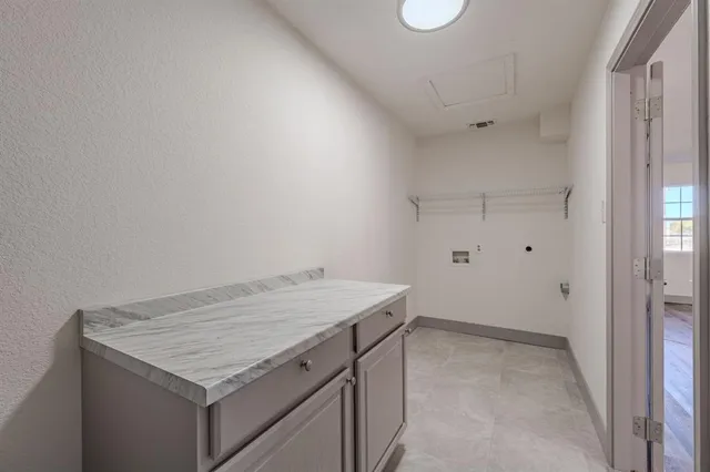 a utility room with washer and dryer