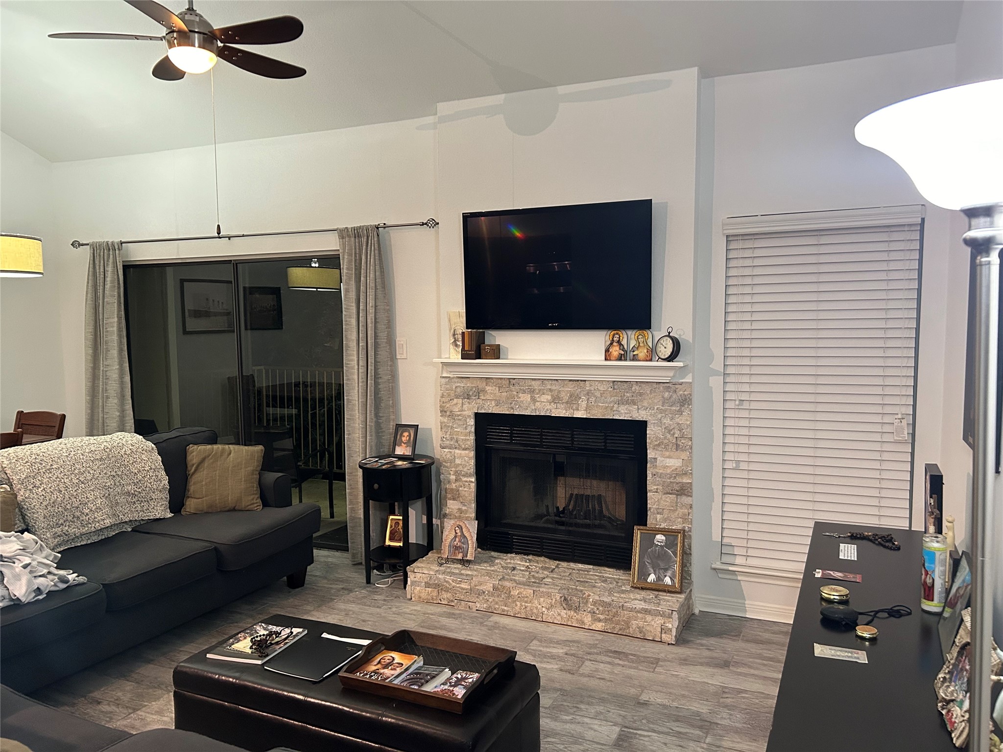 3500 Tangle Brush Drive, Unit 188 Spring, TX 77381 - Photo 4 of 14 Fireplace and door to balcony