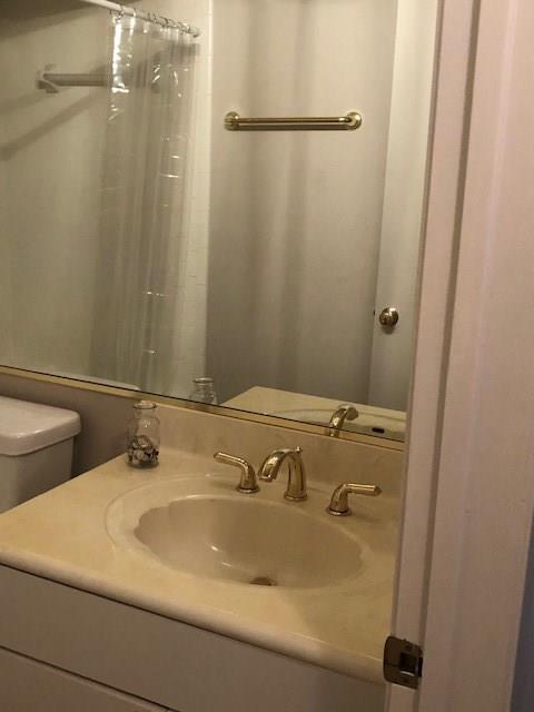 40 North Interstate Highway 35, Unit 2A2 Austin, TX 78701 - Photo 11 of 28 a bathroom with a sink and a mirror