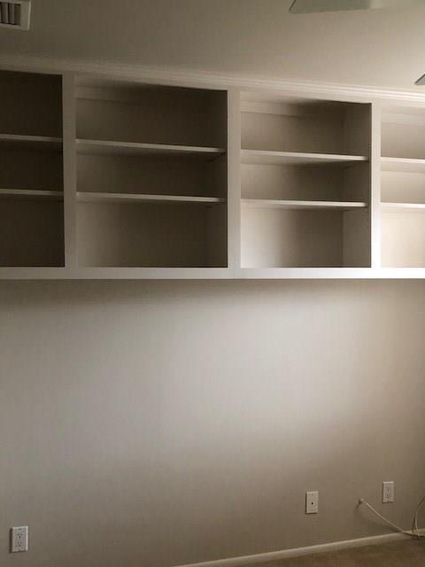 40 North Interstate Highway 35, Unit 2A2 Austin, TX 78701 - Photo 12 of 28 a view of an empty room with empty racks