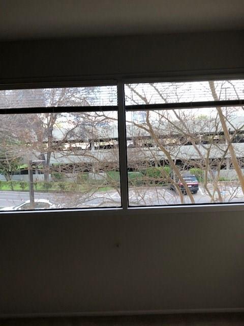 40 North Interstate Highway 35, Unit 2A2 Austin, TX 78701 - Photo 16 of 28 a view of a street from a window