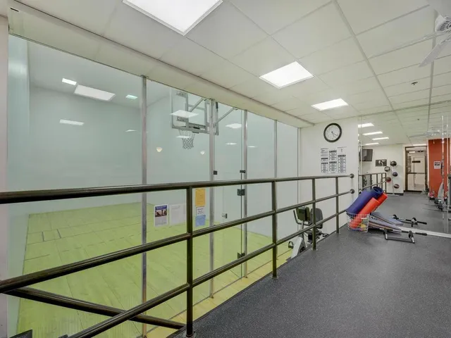 a view of a hallway with an empty room