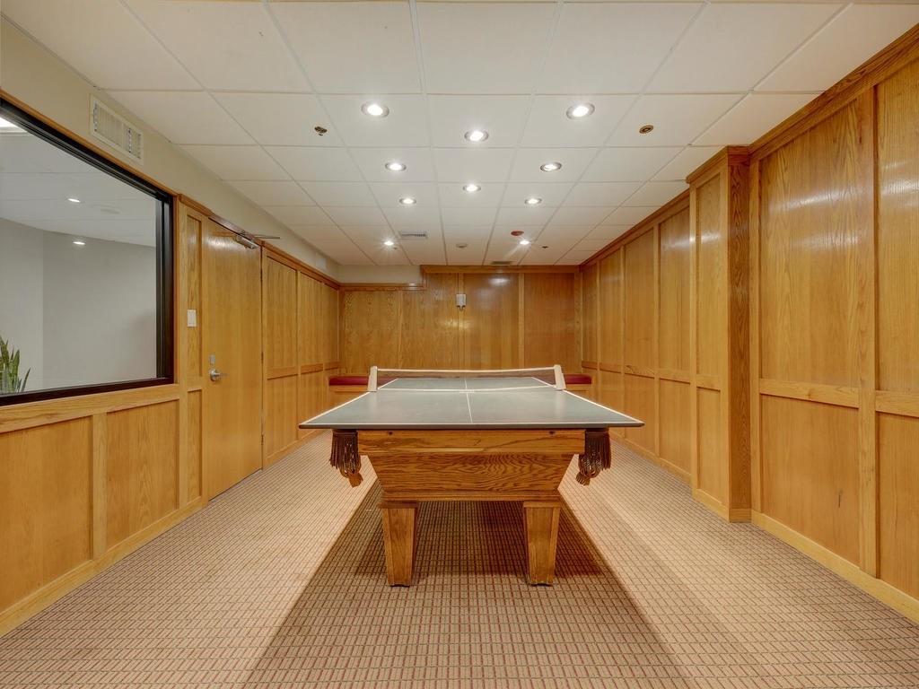 40 North Interstate Highway 35, Unit 2A2 Austin, TX 78701 - Photo 23 of 28 a bathroom with a sink and a mirror