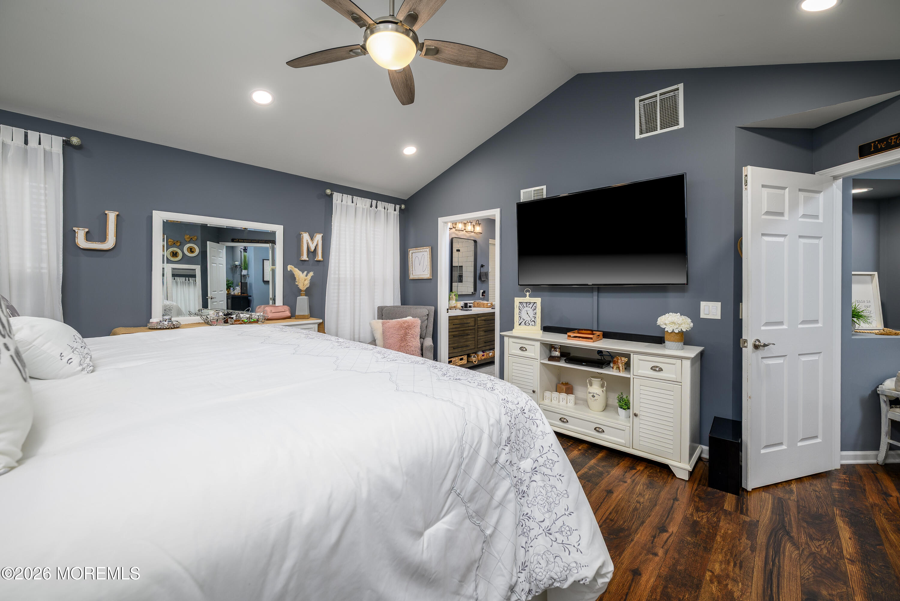 26 Ivy Hill Road Lakewood, NJ 08701 - Photo 20 of 46 a bedroom with a bed and a flat screen tv