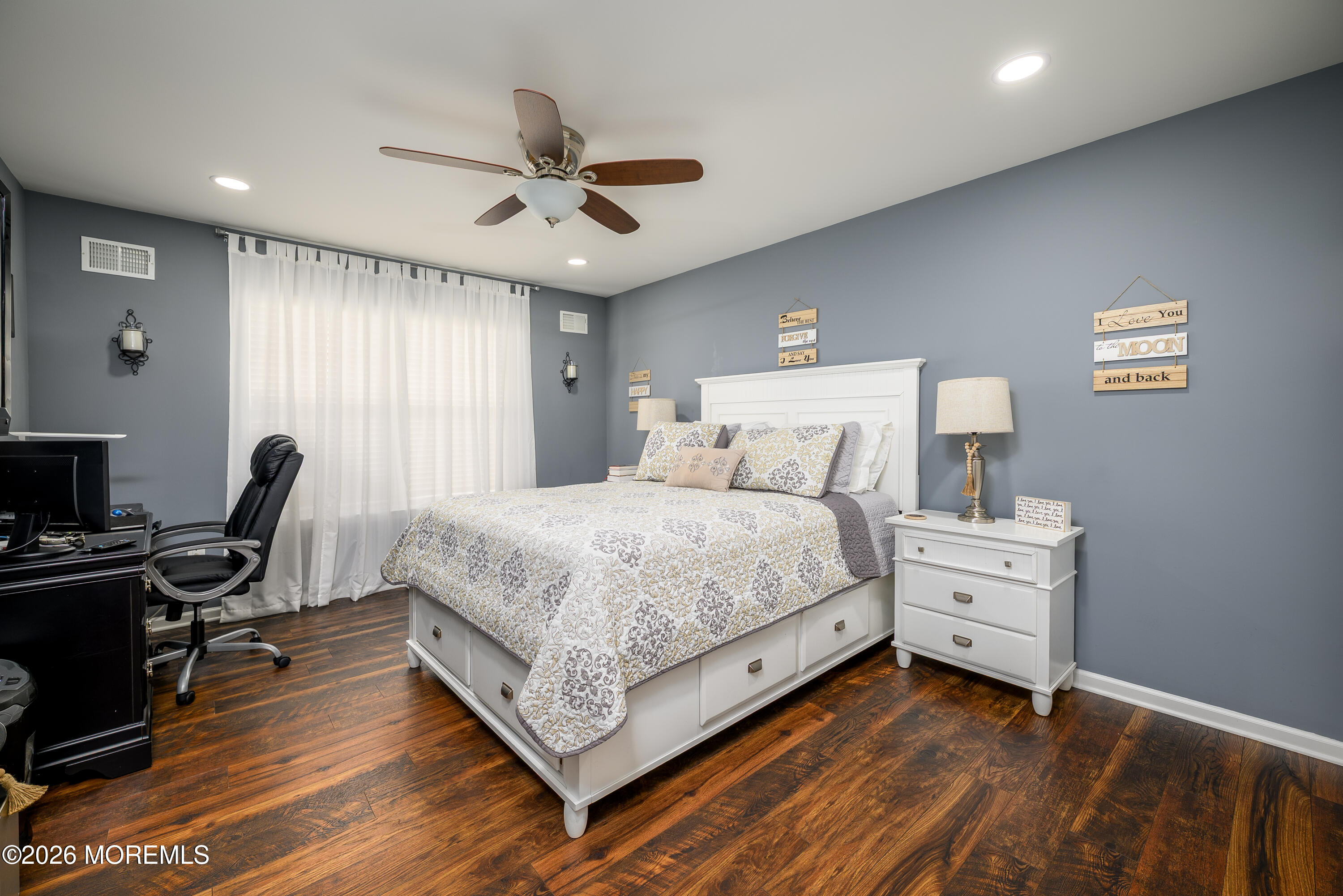 26 Ivy Hill Road Lakewood, NJ 08701 - Photo 27 of 46 a bedroom with a bed and a chandelier