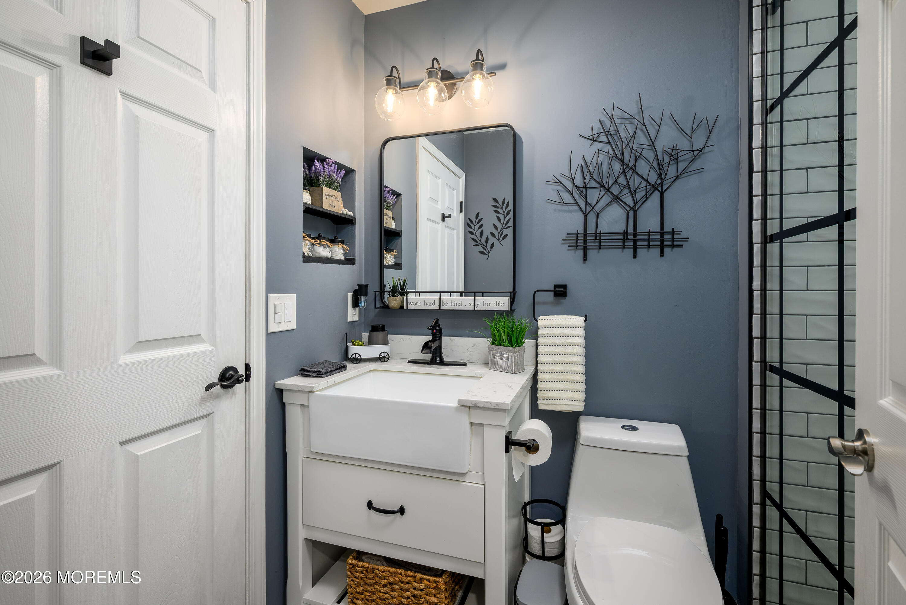 26 Ivy Hill Road Lakewood, NJ 08701 - Photo 29 of 46 a bathroom with a sink vanity mirror and toilet