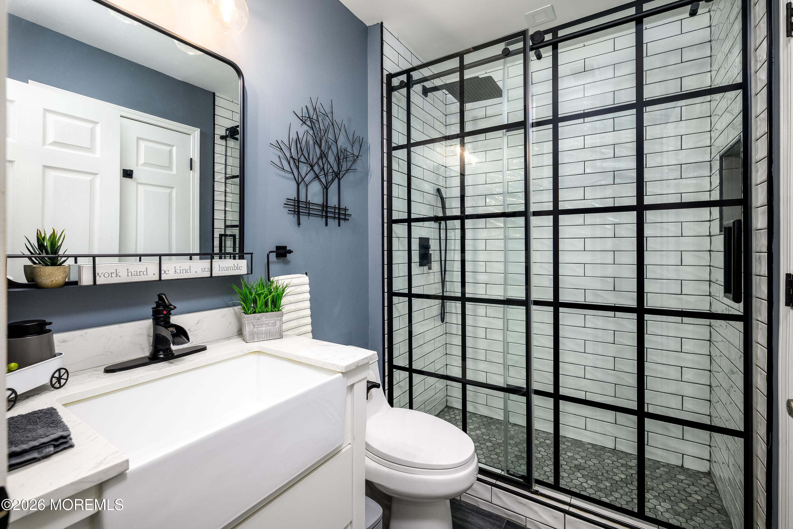 26 Ivy Hill Road Lakewood, NJ 08701 - Photo 30 of 46 a bathroom with a sink toilet and shower