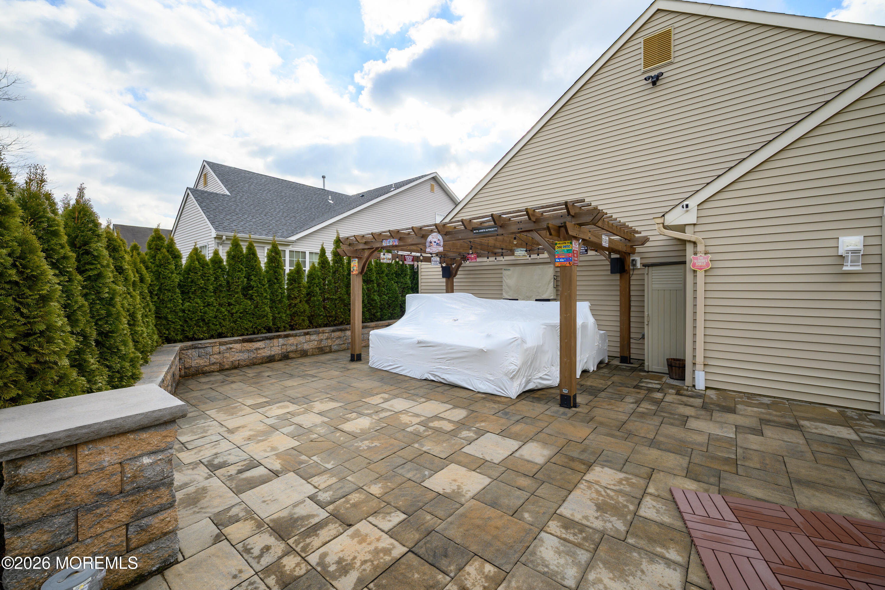 26 Ivy Hill Road Lakewood, NJ 08701 - Photo 37 of 46 a view of a white house in front of a yard
