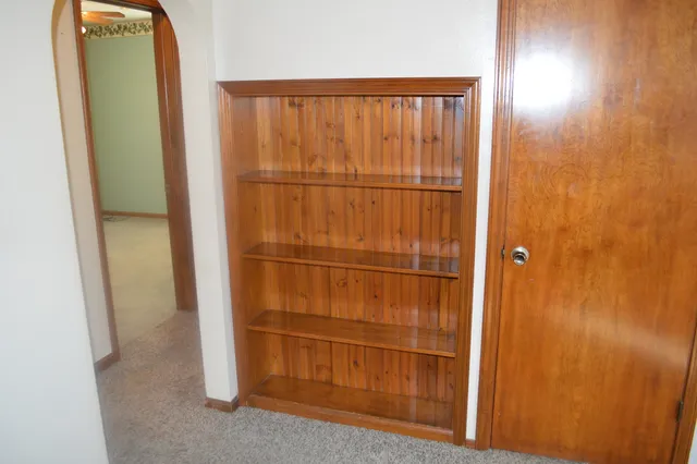 a bathroom with a glass door