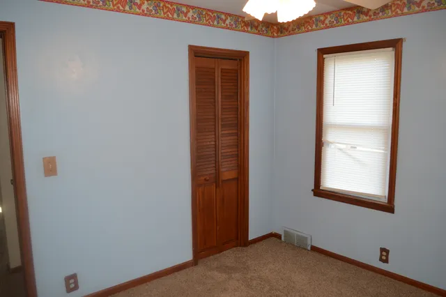 a view of an empty room with window