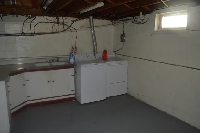 a utility room with dryer and washer