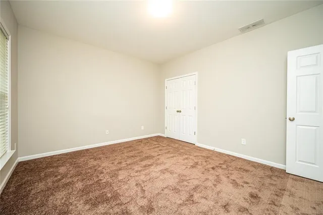 an empty room with an entryway