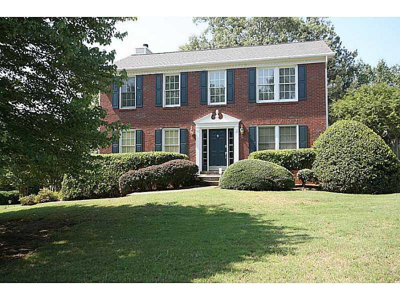 5395 Taylor Road Alpharetta, GA 30022 - Photo 1 of 1 Exterior Front. Excellent location & schools. 4 bed, 2.5 bath home with partial basement on large, level, fenced, private backyard - MUST SEE!
