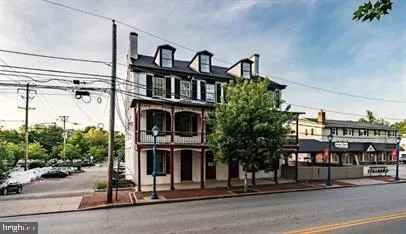 a front view of a building with street view