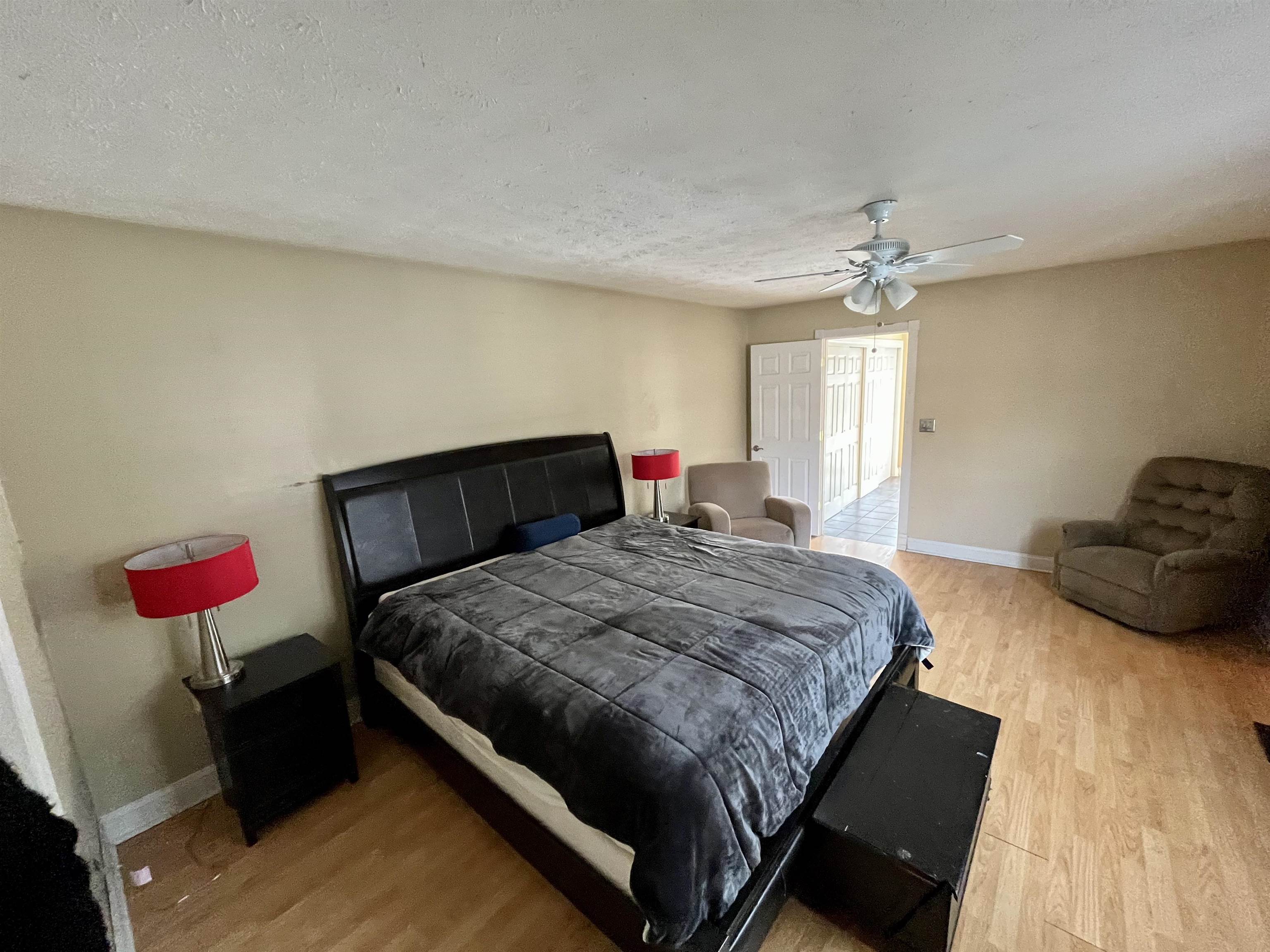 5051 Woodlake Drive Loves Park, IL 61111 - Photo 16 of 20 a bedroom with bed and window