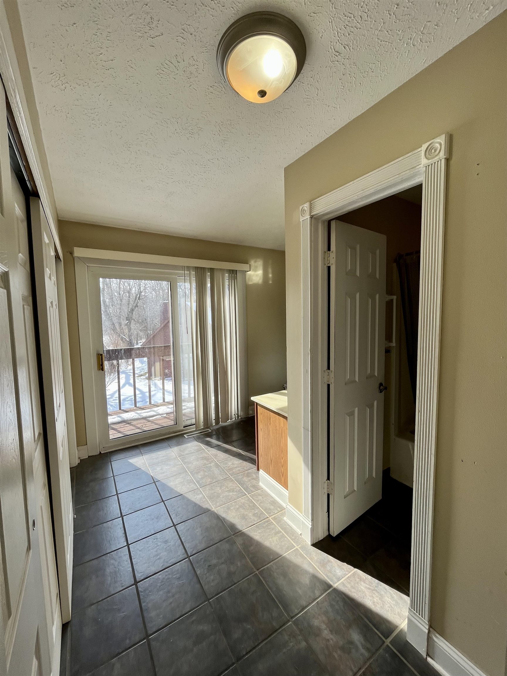 5051 Woodlake Drive Loves Park, IL 61111 - Photo 19 of 20 a view of an empty room and window