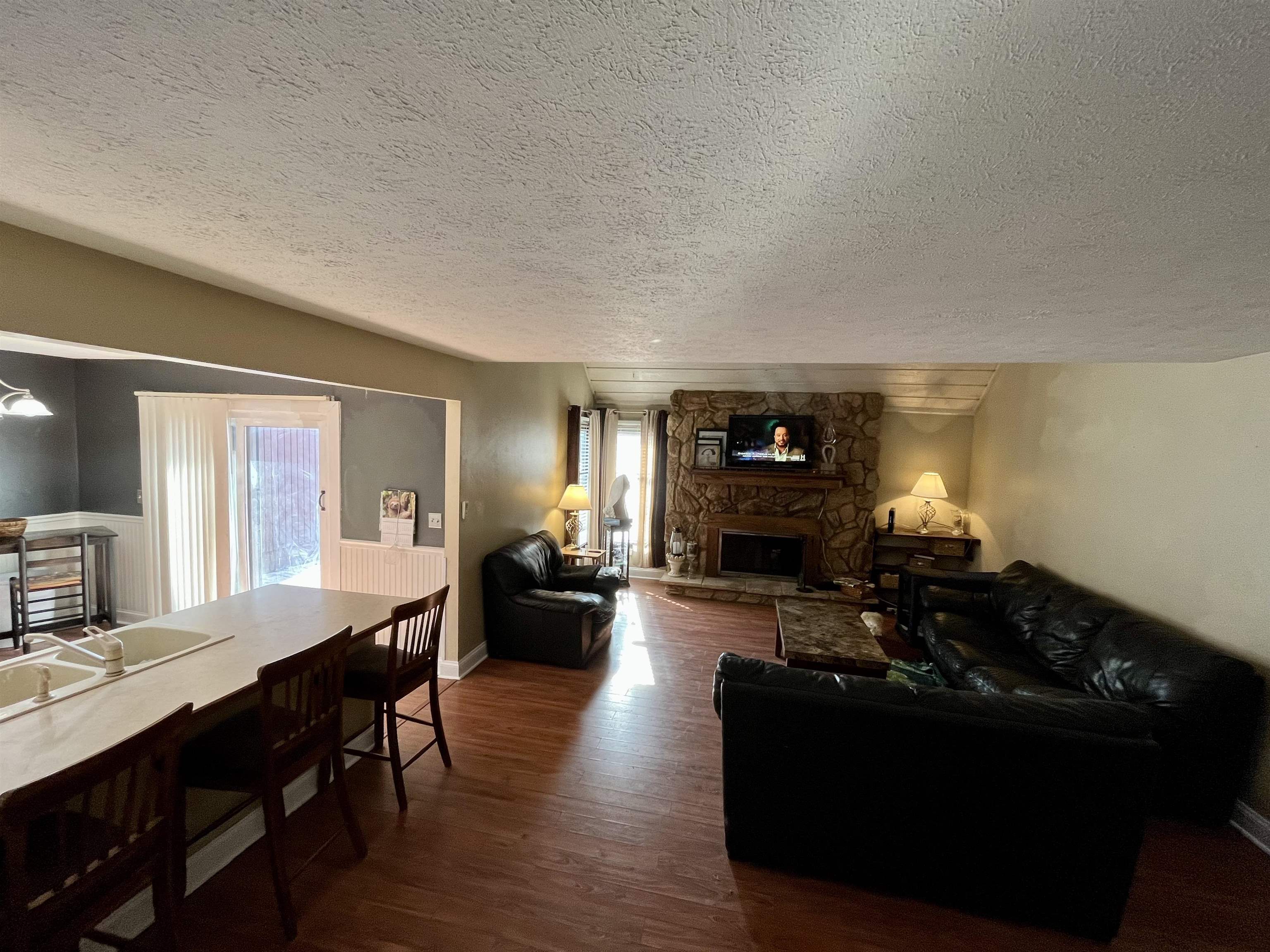 5051 Woodlake Drive Loves Park, IL 61111 - Photo 6 of 20 a living room with furniture and wooden floor
