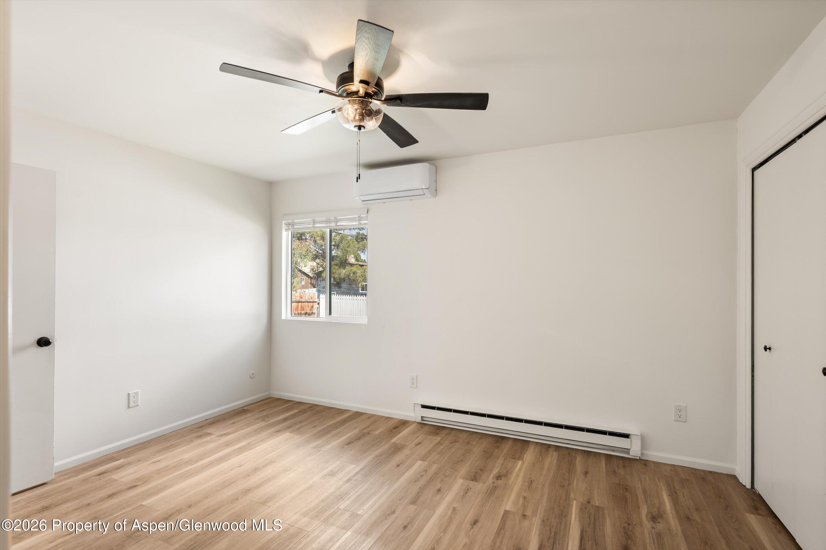 942 West 5th Street Rifle, CO 81650 - Photo 12 of 23 a view of an empty room with a window