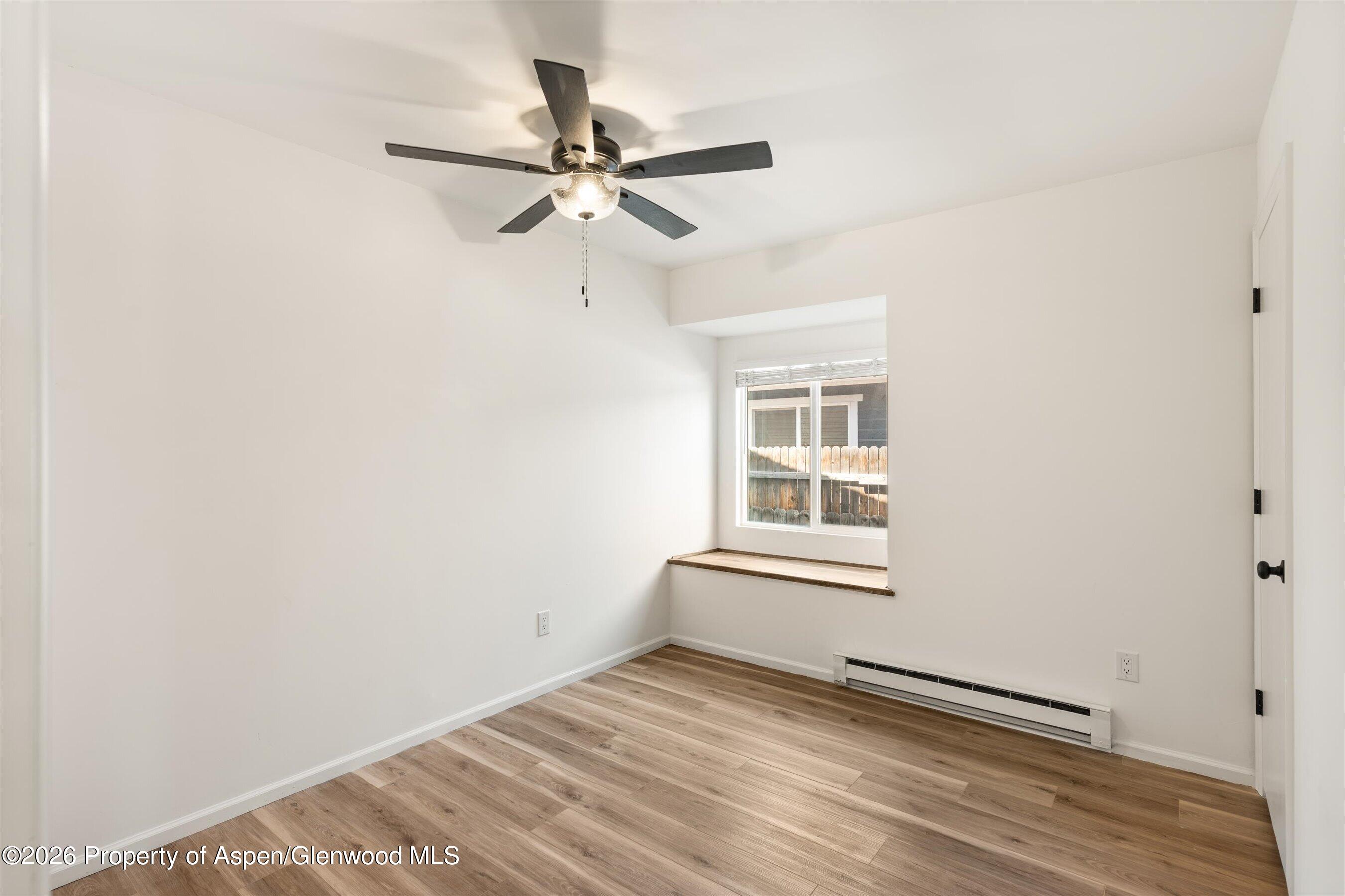 942 West 5th Street Rifle, CO 81650 - Photo 16 of 23 a view of an empty room with a window