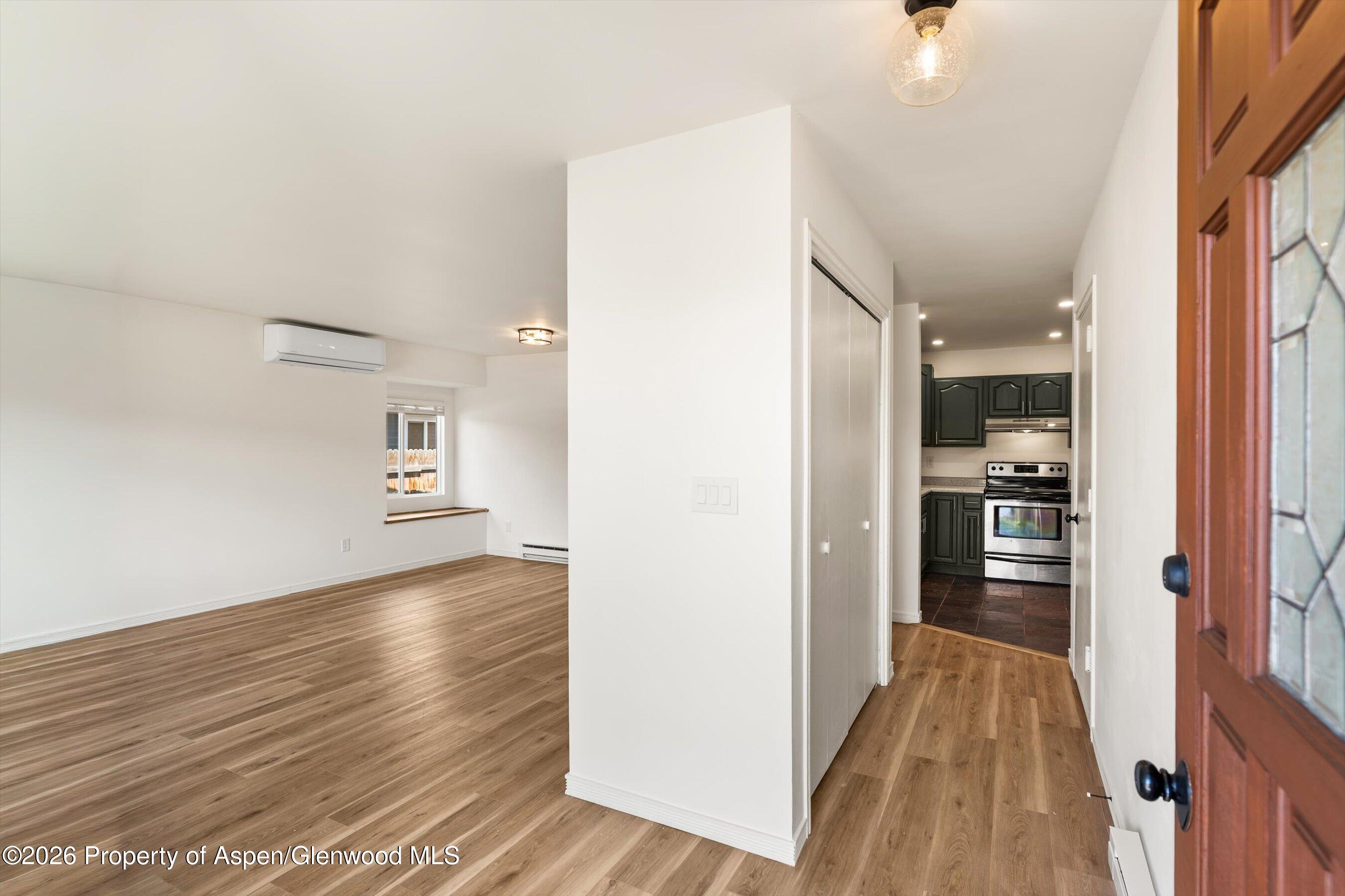 942 West 5th Street Rifle, CO 81650 - Photo 2 of 23 a view of a kitchen from the hallway