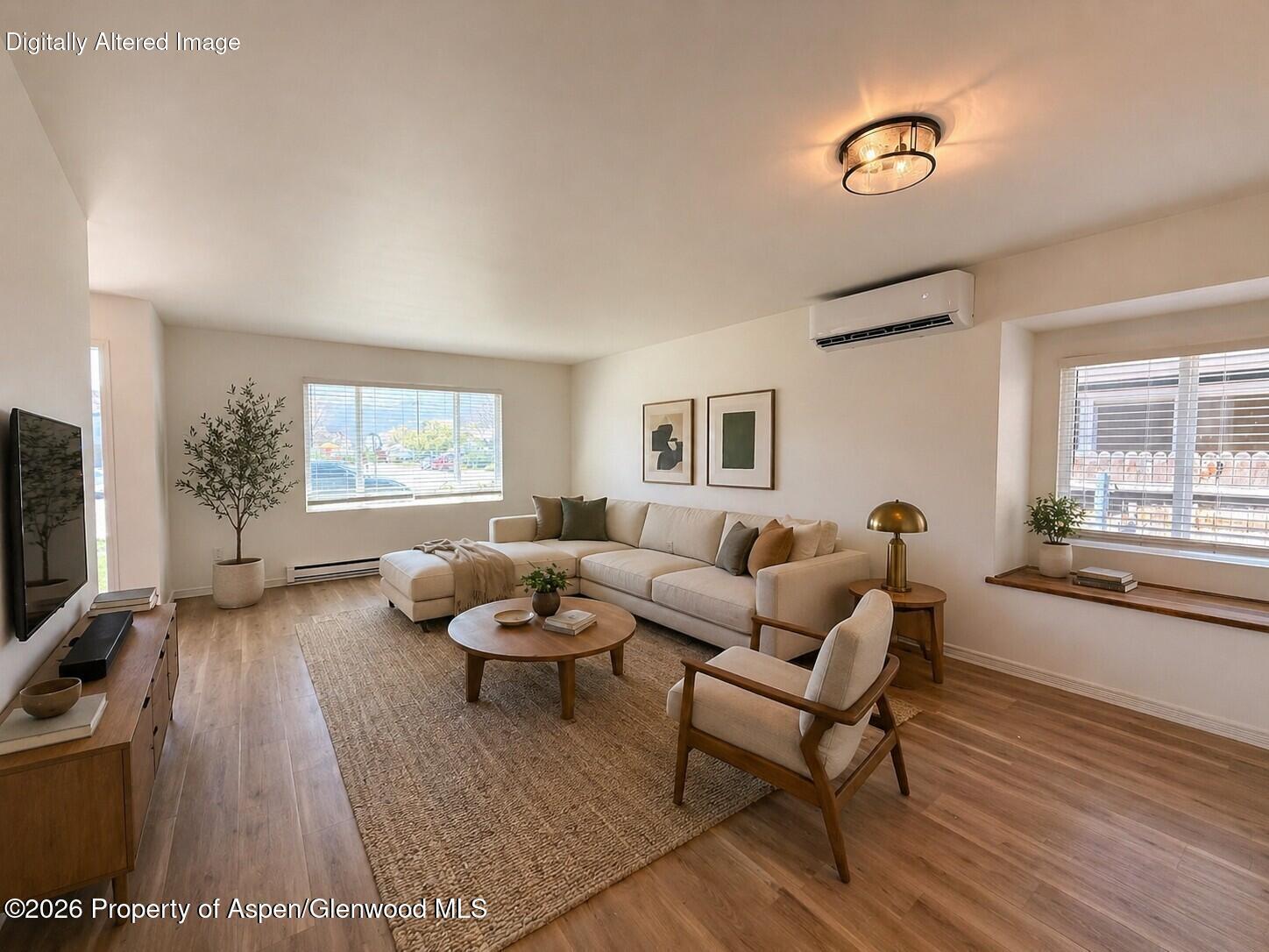 942 West 5th Street Rifle, CO 81650 - Photo 4 of 23 a living room with furniture and a window