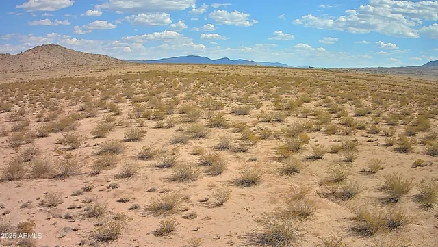 a view of an outdoor space and mountain view
