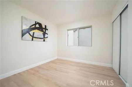 a view of a livingroom with wooden floor