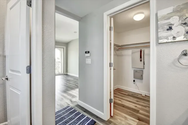 a view of a bathroom with a sink and mirror