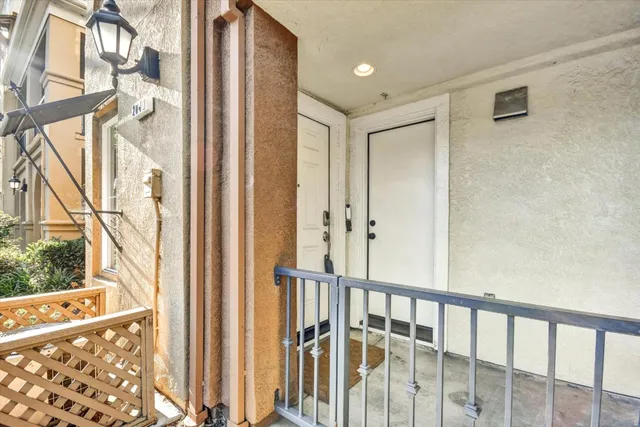 a view of a balcony with wooden floor