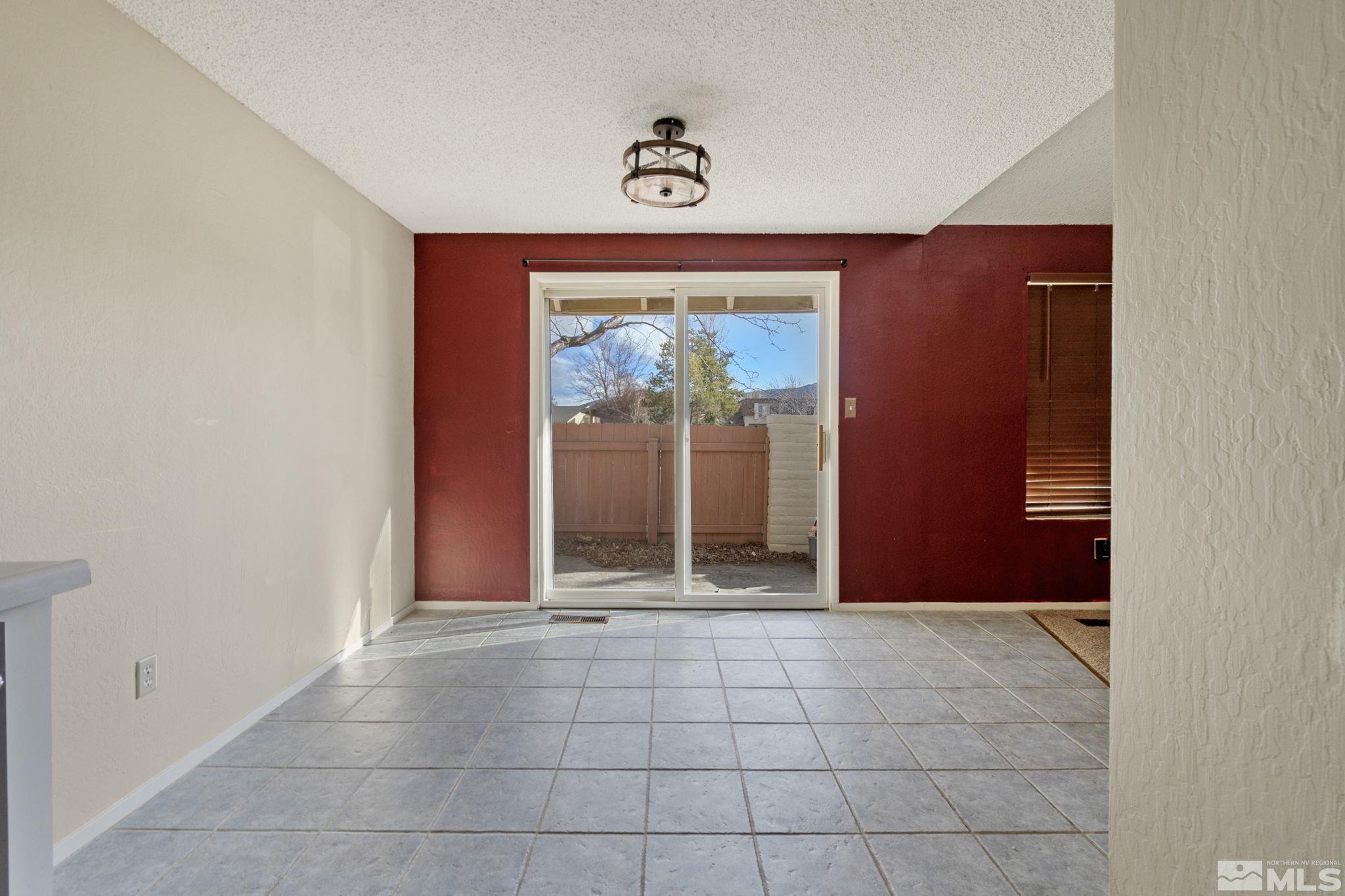 68 Condor Circle Carson City, NV 89701 - Photo 13 of 33 an empty room with windows and closet