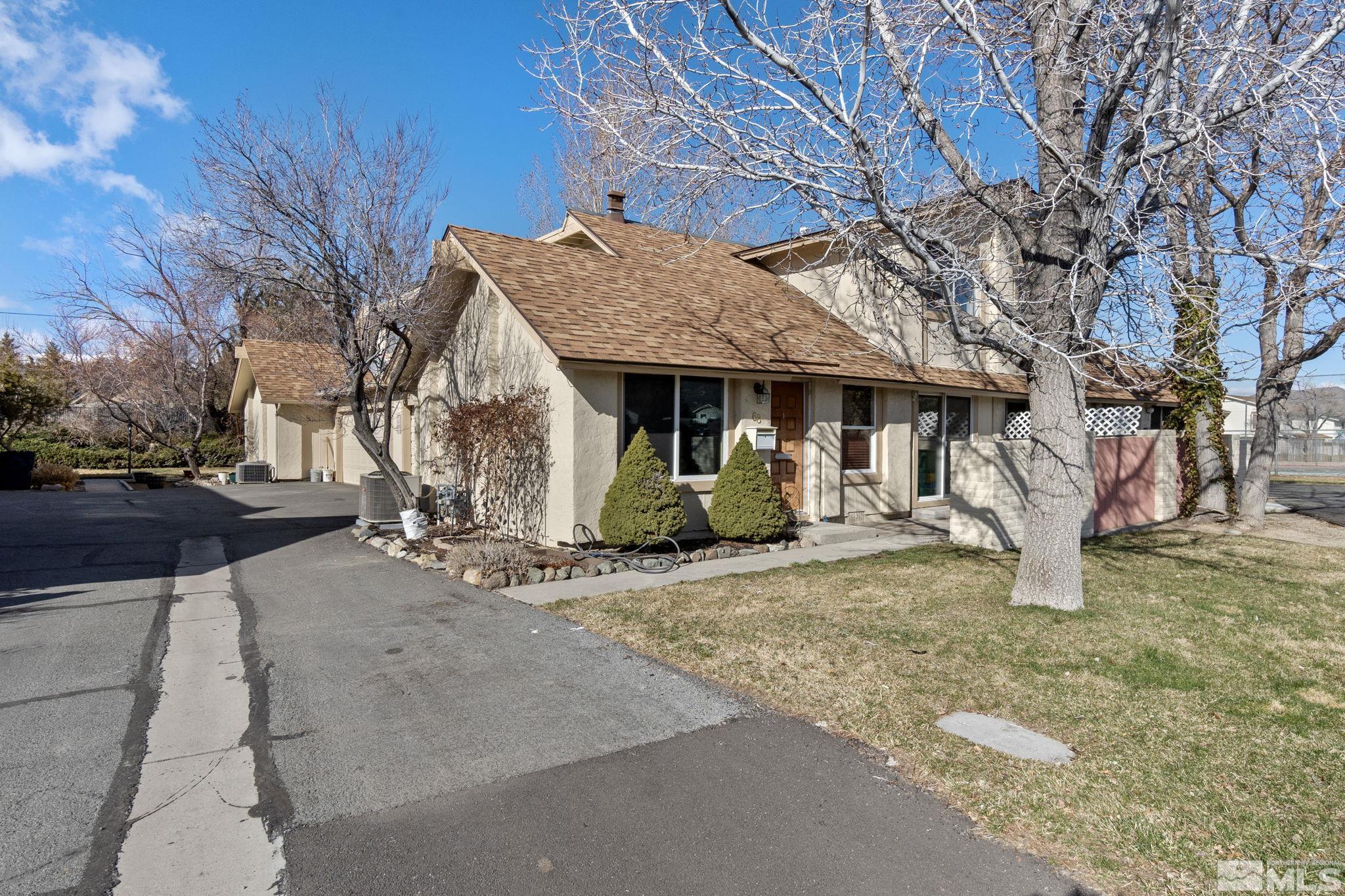 68 Condor Circle Carson City, NV 89701 - Photo 2 of 33 a view of a house with a yard